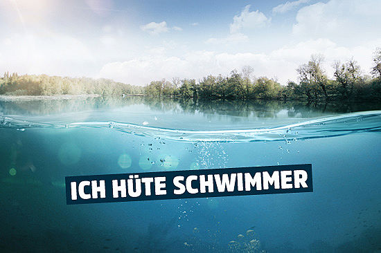 Foto: ein See, teils unter Wasser aufgenommen. Text: „Ich hüte Schwimmer.“