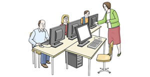 Vier Personen nehmen an einem Computerkurs teil
