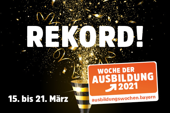 Aus einem Partykracher schießen Goldflitter und goldene Luftschlangen empor. 